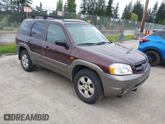2001 Mazda Tribute LX with VIN 4F2CU08141KM10269, listed as a IAAI auction lot 42138704 with 166,825 mi miles and . Bid and sale history available at carsss.com. Image 1.