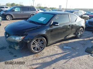 2013 Scion tC with VIN JTKJF5C77D3050609, listed as a IAAI auction lot 41872911 with 197,531 mi miles. Bid and sale history available at carsss.com. Image 18.