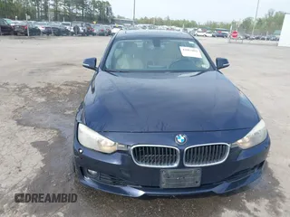 2013 BMW 3 Series 328i xDrive with VIN WBA3B5G53DNS02293, listed as a IAAI auction lot 42012883 with 243,490 mi miles. Bid and sale history available at carsss.com. Image 12.