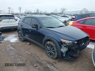 2017 Mazda CX-3 Touring z VIN JM1DKFC75H0173127, wystawiony jako IAAI lot #41614605 z przebiegiem 101 963 mil mil oraz . Historia ofert i sprzedaży dostępna na DreamBid. Obrazek 1.