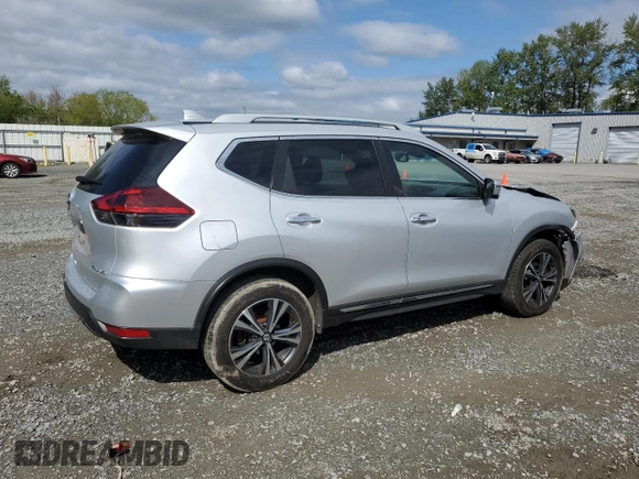 2018 Nissan Rogue SV with VIN 5N1AT2MV9JC745208, listed as a Copart auction lot 54976985 with 101,352 mi miles and Salvage Title. Bid and sale history available at DreamBid. Image 3.