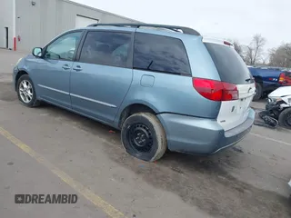 2005 Toyota Sienna XLE with VIN 5TDBA22CX5S039921, listed as a IAAI auction lot 41812339 with 245,111 mi miles and . Bid and sale history available at DreamBid. Image 3.