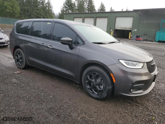 2023 Chrysler Pacifica Hybrid Touring L with VIN 2C4RC1L76PR543771, listed as a Copart auction lot 43982305 with 105,858 mi miles and Salvage Title. Bid and sale history available at carsss.com. Image 4.