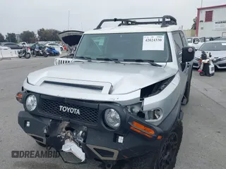2007 Toyota FJ Cruiser with VIN JTEBU11F370036941, listed as a IAAI auction lot 42024330 with 164,703 mi miles. Bid and sale history available at carsss.com. Image 17.