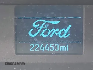 2015 Ford Transit Cargo z VIN 1FTNR2CM4FKA84584, wystawiony jako IAAI lot #42008193 z przebiegiem 224 453 mil mil oraz . Historia ofert i sprzedaży dostępna na DreamBid. Obrazek 15.