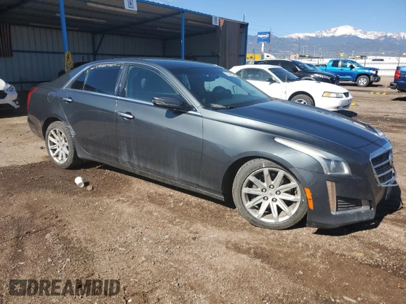 2014 Cadillac CTS AWD with VIN 1G6AW5SX2E0141060, listed as a Copart auction lot 57281445 with 137,904 mi miles and Salvage title. Bid and sale history available at DreamBid. Image 4.