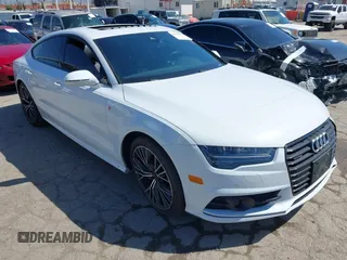 2018 Audi A7 Premium Plus z VIN WAUW3AFCXJN052570, wystawiony jako IAAI lot #41990238 z przebiegiem 53 810 mil mil oraz . Historia ofert i sprzedaży dostępna na DreamBid. Obrazek 1.