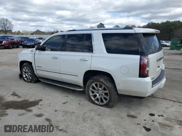 2016 GMC Yukon Denali with VIN 1GKS1CKJ4GR180185, listed as a Copart auction lot 47815835 with 197,506 mi miles and Salvage Title. Bid and sale history available at DreamBid. Image 2.