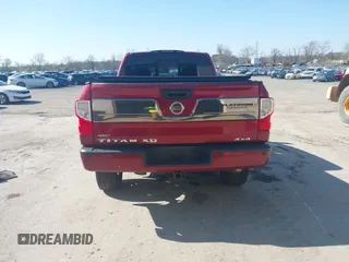 2016 Nissan Titan SL z VIN 1N6BA1F44GN503563, wystawiony jako IAAI lot #41977780 z przebiegiem 126 050 mil mil oraz . Historia ofert i sprzedaży dostępna na DreamBid. Obrazek 17.