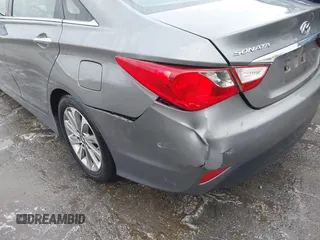 2014 Hyundai Sonata SE with VIN 5NPEC4AC5EH894598, listed as a IAAI auction lot 41242457 with 153,635 mi miles and . Bid and sale history available at DreamBid. Image 16.