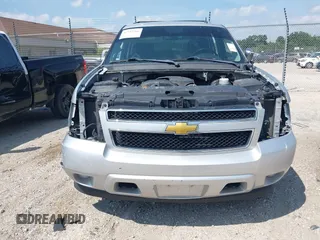 2013 Chevrolet Tahoe LS with VIN 1GNSCAE08DR153829, listed as a IAAI auction lot 42742266 with 216,821 mi miles and . Bid and sale history available at DreamBid. Image 6.