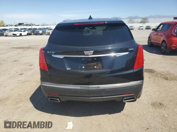 2018 Cadillac XT5 FWD with VIN 1GYKNARS9JZ206977, listed as a Copart auction lot 52776585 with 55,126 mi miles and Salvage Title. Bid and sale history available at carsss.com. Image 6.