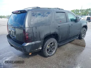 2007 Chevrolet Tahoe LTZ with VIN 1GNFC13J17J149752, listed as a IAAI auction lot 42632542 with 313,740 mi miles and . Bid and sale history available at DreamBid. Image 4.