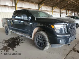 2019 Nissan Titan XD SL with VIN 1N6BA1F47KN534864, listed as a Copart auction lot 65651974 with 79,230 mi miles and Salvage Title. Bid and sale history available at carsss.com. Image 4.