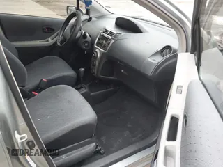 2010 Toyota Yaris with VIN JTDKT4K33A5314776, listed as a IAAI auction lot 41570383 with 167,428 mi miles. Bid and sale history available at carsss.com. Image 5.