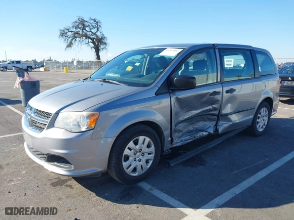 2015 Dodge Grand Caravan SE Plus with VIN 2C4RDGBG7FR516174, listed as a IAAI auction lot 41313989 with 106,867 mi miles. Bid and sale history available at carsss.com. Image 17.