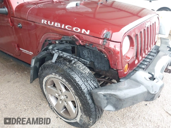 2010 Jeep Wrangler Unlimited Rubicon z VIN 1J4HA6H18AL180628, wystawiony jako IAAI lot #42110357 z przebiegiem 217 940 mil mil oraz . Historia ofert i sprzedaży dostępna na DreamBid. Obrazek 6.