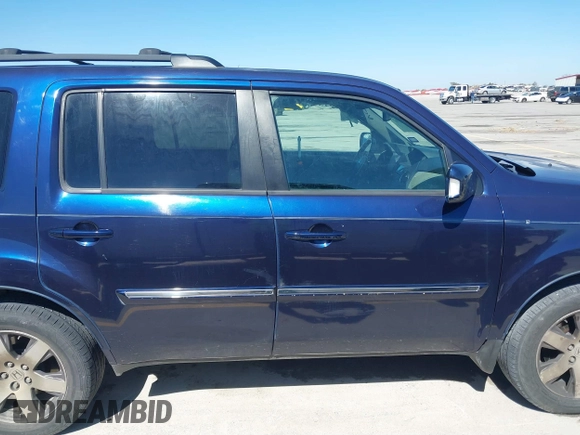 2013 Honda Pilot Touring with VIN 5FNYF3H94DB018384, listed as a IAAI auction lot 41672767 with 188,922 mi miles and . Bid and sale history available at DreamBid. Image 13.
