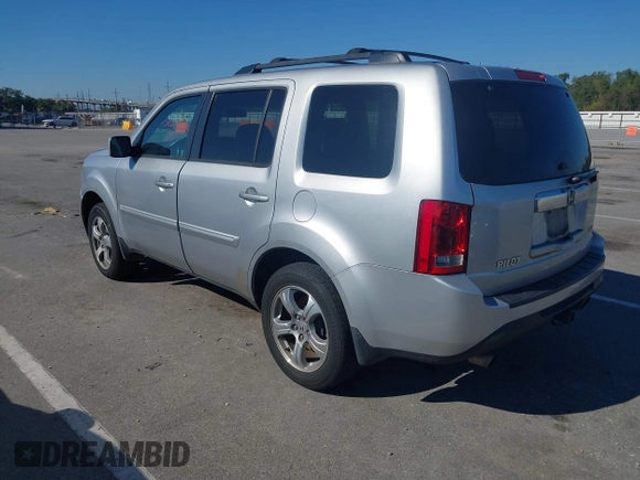 2015 Honda Pilot EX-L with VIN 5FNYF3H69FB001265, listed as a IAAI auction lot 41017830 with 188,572 mi miles and . Bid and sale history available at carsss.com. Image 3.