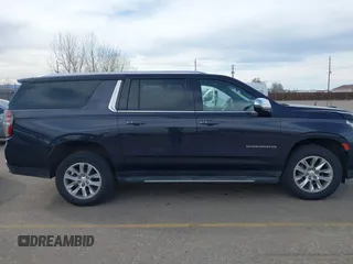 2022 Chevrolet Suburban Premier with VIN 1GNSKFKD5NR293216, listed as a IAAI auction lot 41778432 with 76,471 mi miles. Bid and sale history available at carsss.com. Image 13.