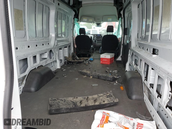 2021 Ford Transit Cargo z VIN 1FTBR3X81MKA18089, wystawiony jako Copart lot #53287124 z przebiegiem Nie podano mil oraz Czysty tytuł • Clean title. Historia ofert i sprzedaży dostępna na DreamBid. Obrazek 10.