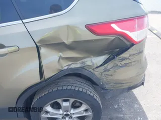 2013 Ford Escape SEL с VIN 1FMCU9H99DUC87471, выставлен на аукционе IAAI как лот 41863601 с пробегом 225 429 миль миль и . История ставок и продаж доступна на DreamBid. Изображение 6.