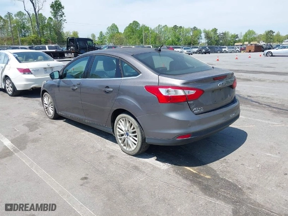 2012 Ford Focus SEL with VIN 1FAHP3H28CL282080, listed as a IAAI auction lot 42039926 with 134,785 mi miles. Bid and sale history available at carsss.com. Image 3.