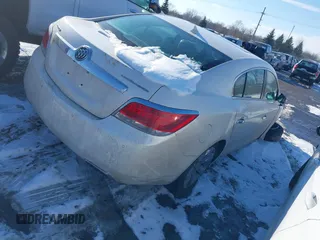 2013 Buick LaCrosse Premium 1 with VIN 1G4GF5E37DF311548, listed as a IAAI auction lot 41358957 with 160,612 mi miles and . Bid and sale history available at DreamBid. Image 4.