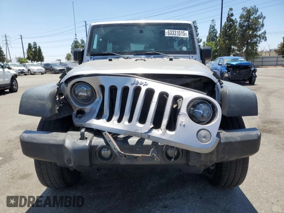 2014 Jeep Wrangler Unlimited Sport with VIN 1C4HJWDG1EL221302, listed as a Copart auction lot 63331015 with 213,912 mi miles and Salvage title. Bid and sale history available at DreamBid. Image 5.