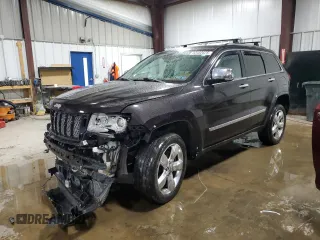 2013 Jeep Grand Cherokee Overland with VIN 1C4RJFCT7DC587329, listed as a Copart auction lot 53432625 with 98,938 mi miles and Salvage Title. Bid and sale history available at carsss.com. Image 1.