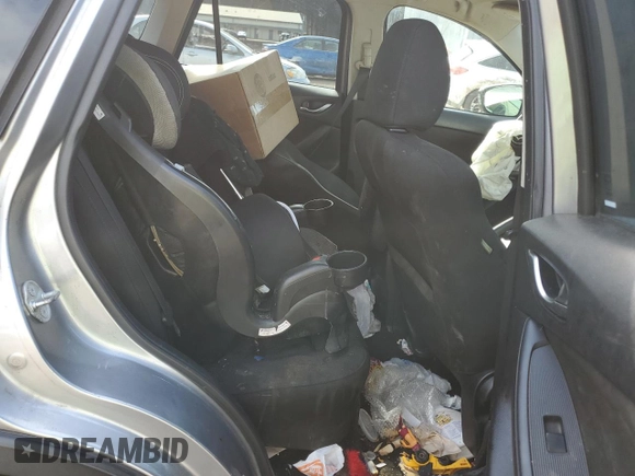 2015 Mazda CX-5 Touring with VIN JM3KE2CY7F0435914, listed as a Copart auction lot 61885704 with 0 mi miles and Salvage Title. Bid and sale history available at carsss.com. Image 12.