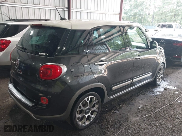 2014 FIAT 500L Trekking with VIN ZFBCFADH6EZ017800, listed as a IAAI auction lot 42572995 with 99,646 mi miles and . Bid and sale history available at DreamBid. Image 4.