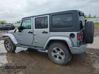 2018 Jeep Wrangler Unlimited Sahara with VIN 1C4HJWEG5JL930372, listed as a Copart auction lot 50772625 with 91,528 mi miles and Salvage title. Bid and sale history available at DreamBid. Image 2.