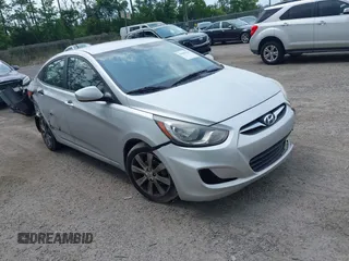 2013 Hyundai Accent GLS z VIN KMHCU4AE1DU354901, wystawiony jako IAAI lot #42069500 z przebiegiem 169 905 mil mil oraz . Historia ofert i sprzedaży dostępna na DreamBid. Obrazek 1.