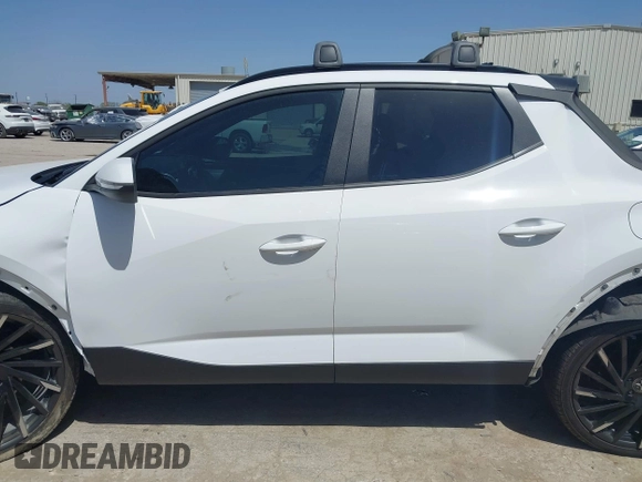 2023 Hyundai Santa Cruz SEL Premium z VIN 5NTJDDAF2PH075610, wystawiony jako IAAI lot #41855459 z przebiegiem 17 872 mil mil oraz . Historia ofert i sprzedaży dostępna na DreamBid. Obrazek 13.
