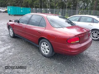 2000 Oldsmobile Intrigue GX z VIN 1G3WH52HXYF300866, wystawiony jako IAAI lot #42315649 z przebiegiem 100 955 mil mil oraz . Historia ofert i sprzedaży dostępna na DreamBid. Obrazek 3.
