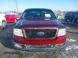 2005 Ford F-150 XLT with VIN 1FTPX12585NA02887, listed as a IAAI auction lot 41353228 with 162,863 mi miles. Bid and sale history available at carsss.com. Image 12.