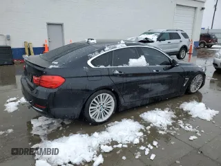 2015 BMW 4 Series 428i xDrive with VIN WBA4C9C54FD330601, listed as a Copart auction lot 45168955 with 112,408 mi miles and Salvage title. Bid and sale history available at DreamBid. Image 3.