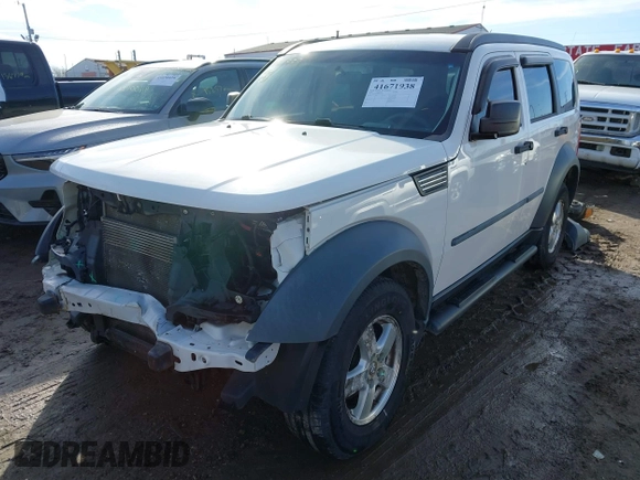 2008 Dodge Nitro SXT with VIN 1D8GU28K18W113714, listed as a IAAI auction lot 41671938 with 118,629 mi miles. Bid and sale history available at carsss.com. Image 2.