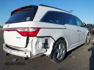 2011 Honda Odyssey Touring с VIN 5FNRL5H96BB002421, выставлен на аукционе IAAI как лот 42297384 с пробегом 128 472 миль миль и . История ставок и продаж доступна на DreamBid. Изображение 4.
