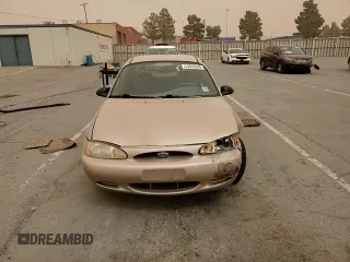 1999 Ford Escort LX с VIN 1FAFP10P2XW132084, выставлен на аукционе Copart как лот 53642945 с пробегом 142 227 миль миль и Списание • Salvage title. История ставок и продаж доступна на DreamBid. Изображение 13.