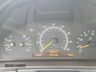 1999 Mercedes-Benz E-Class with VIN WDBJF65H4XA883351, listed as a Copart auction lot 73682964 with 156,446 mi miles and Salvage Title. Bid and sale history available at carsss.com. Image 9.