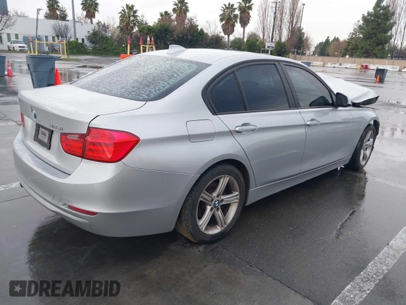 2013 BMW 3 Series 328i with VIN WBA3C1G59DNN93746, listed as a IAAI auction lot 41527720 with 215,442 mi miles and . Bid and sale history available at DreamBid. Image 4.