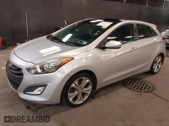 2013 Hyundai Elantra GT with VIN KMHD35LE2DU105677, listed as a IAAI auction lot 42027623 with 137,063 mi miles. Bid and sale history available at carsss.com. Image 17.