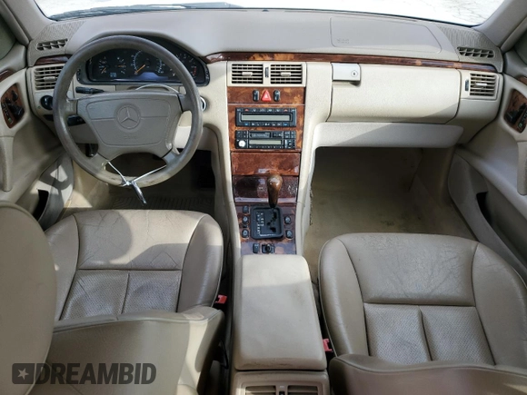 1998 Mercedes-Benz E-Class with VIN WDBJF65F4WA665505, listed as a Copart auction lot 42311695 with 389,016 mi miles and Salvage Title. Bid and sale history available at carsss.com. Image 8.