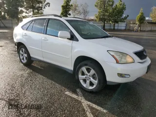 2006 Lexus RX 330 with VIN JTJGA31UX60060839, listed as a Copart auction lot 79948144 with 168,640 mi miles and Salvage Title. Bid and sale history available at DreamBid. Image 4.