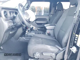 2022 Jeep Wrangler Unlimited High Tide with VIN 1C4HJXDG1NW134486, listed as a Copart auction lot 75280764 with 61,282 mi miles and Salvage Title. Bid and sale history available at DreamBid. Image 7.