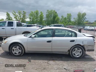 2003 Nissan Altima S z VIN 1N4AL11D63C136161, wystawiony jako IAAI lot #42461610 z przebiegiem 248 121 mil mil oraz . Historia ofert i sprzedaży dostępna na DreamBid. Obrazek 15.