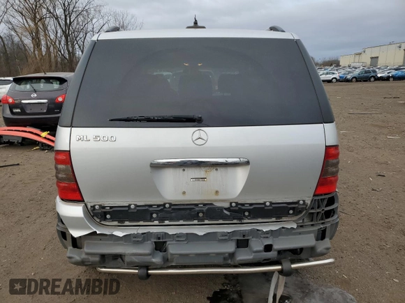 2005 Mercedes-Benz M 500 with VIN 4JGAB75E65A532359, listed as a Copart auction lot 41510825 with 139,916 mi miles and Salvage title. Bid and sale history available at DreamBid. Image 6.