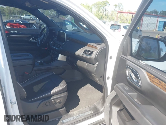 2023 Chevrolet Suburban Premier with VIN 1GNSCFKDXPR371053, listed as a IAAI auction lot 42045193 with 92,544 mi miles and . Bid and sale history available at DreamBid. Image 5.